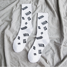 Load image into Gallery viewer, Letter totem in stockings
