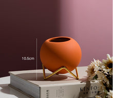 Load image into Gallery viewer, Round Ceramic Plant Pot With Gold Metal Holder
